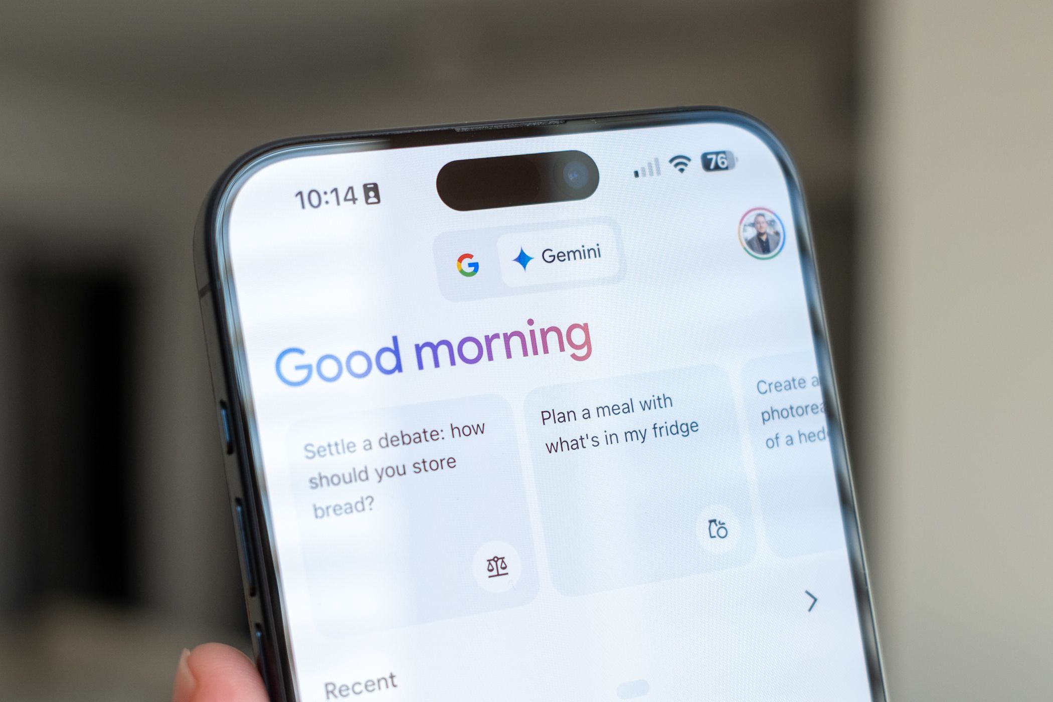 Gemini AI tap selected in the Google app on an Apple iPhone 15 Pro Max