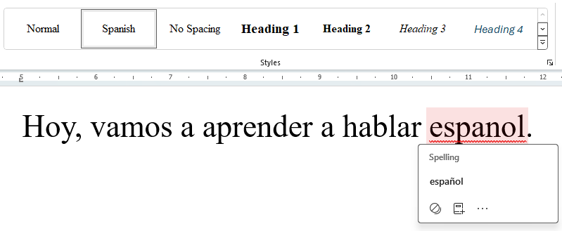 Word document containing a Spanish sentence with an error in &lsquo;espanol&rsquo; and Word&rsquo;s suggestion for correction.
