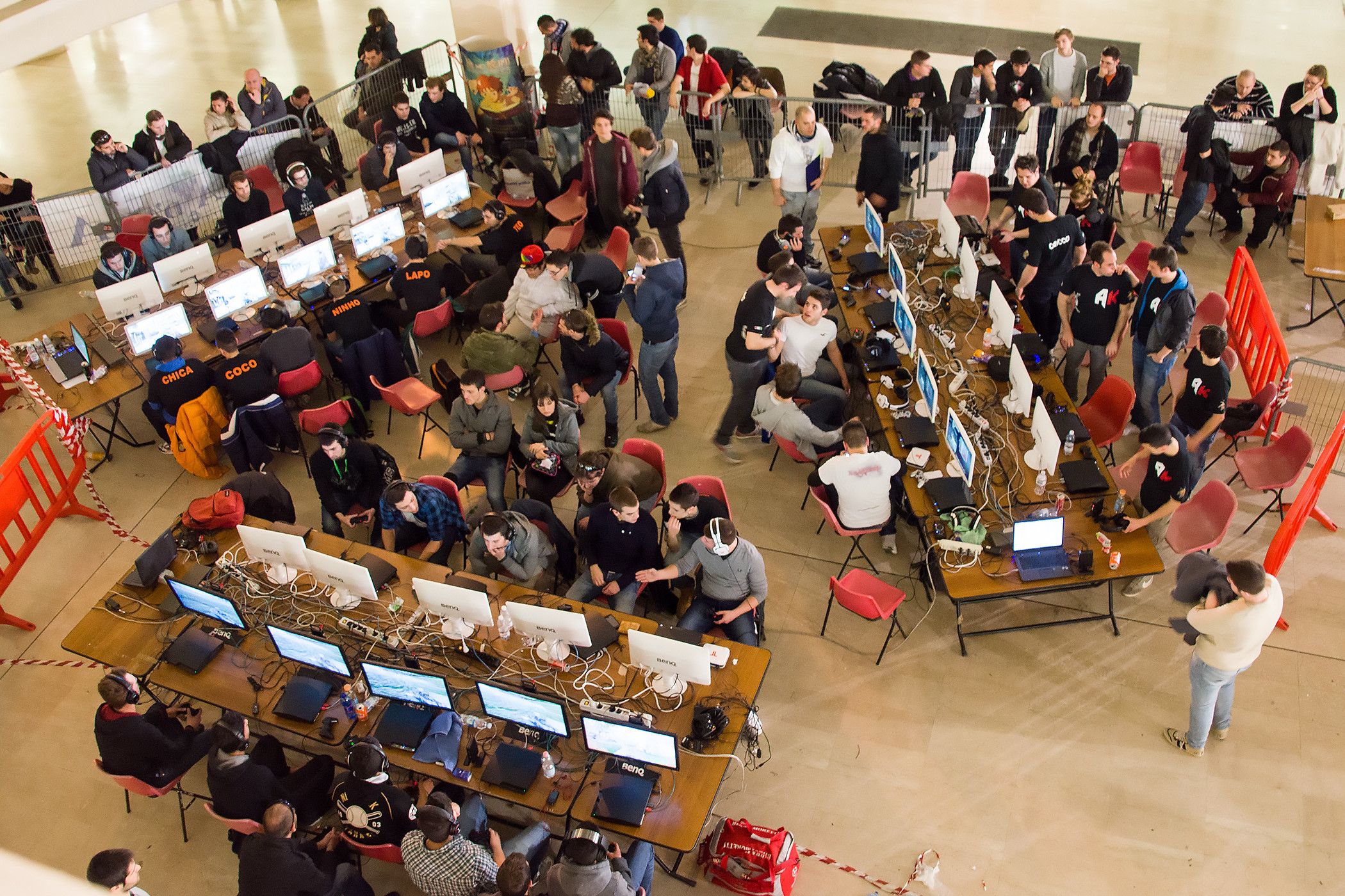 Participants at a LAN party gather to play games.