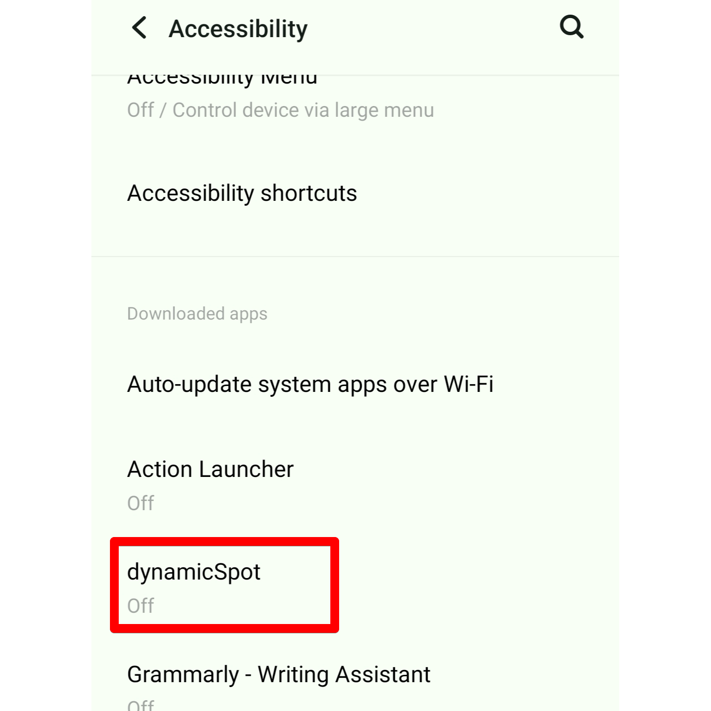 Android's Accessbility menu is open with the dynamicSpot app highlighted. The app needs this permission to display its floating pill.