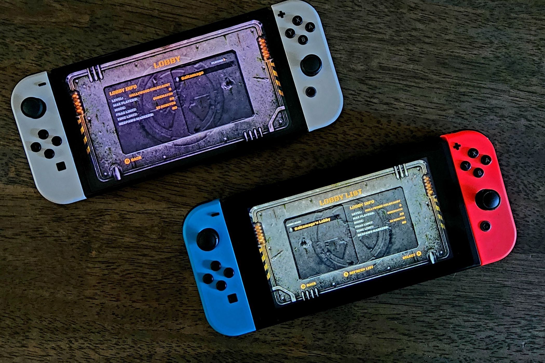 Two Switch consoles showing the local wireless configuration screens for Duke Nukem 3D