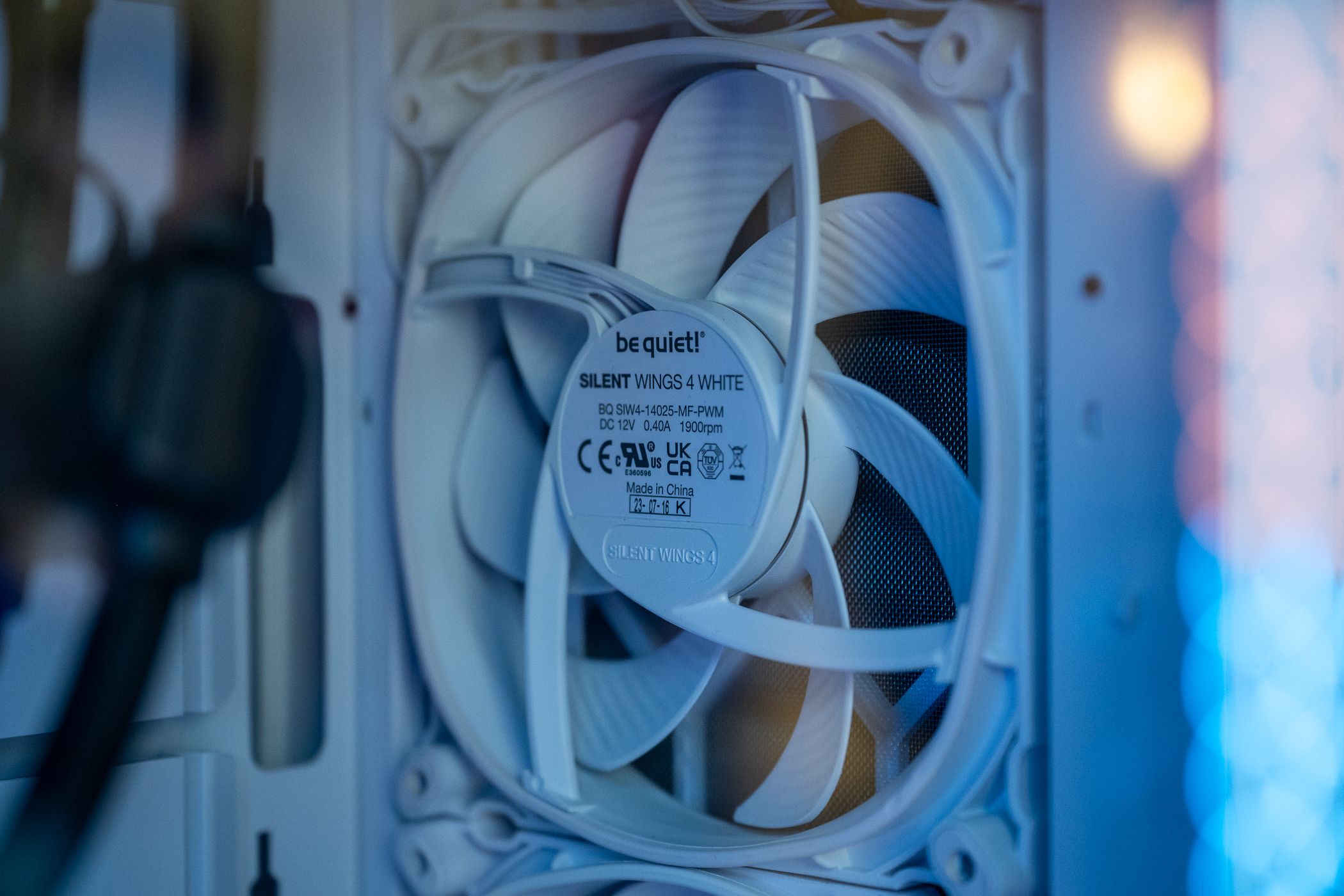 Be Quiet Silent Wings 4 White PC fan inside a gaming computer.