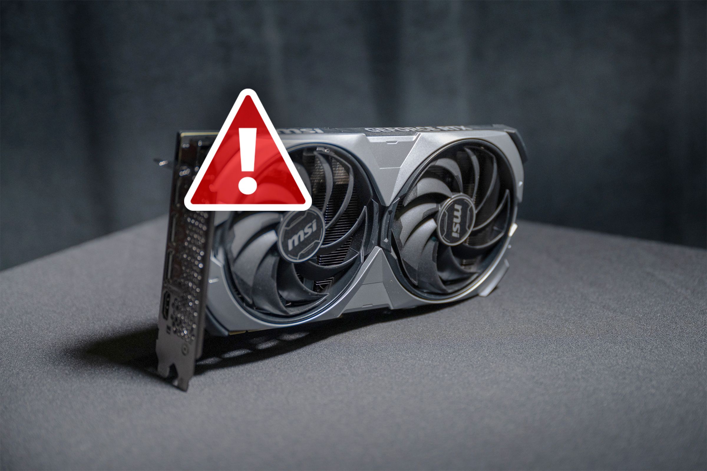 A GPU with a warning icon.