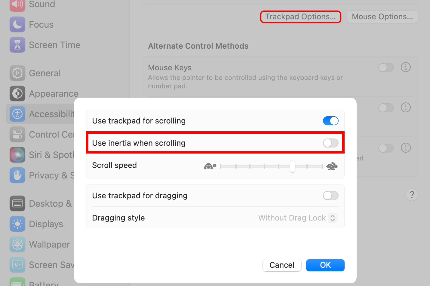 macOS System Settings with the scrolling inertia feature disabled.