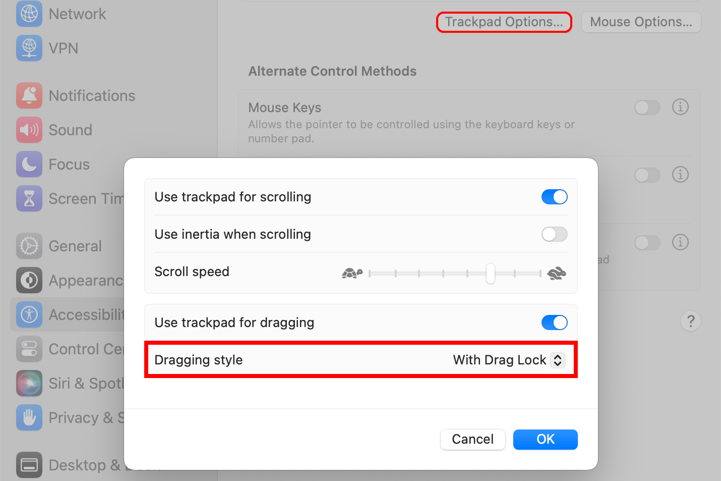 macOS System Settings with the Drag Lock turned on in the trackpad options.