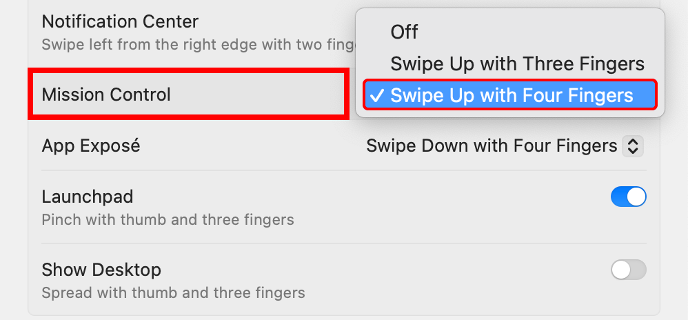 Assigning four-finger swipe-up gesture to macOS Mission Control in System Settings.