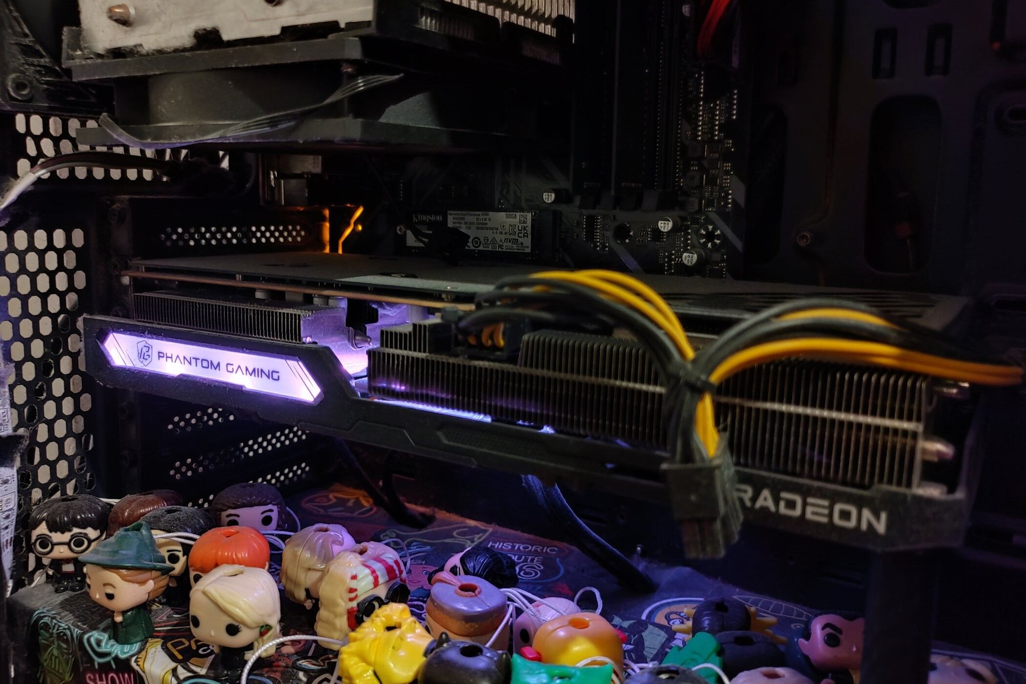 The AMD RX 6600 XT Phantom Gaming D graphics card inside of a computer.