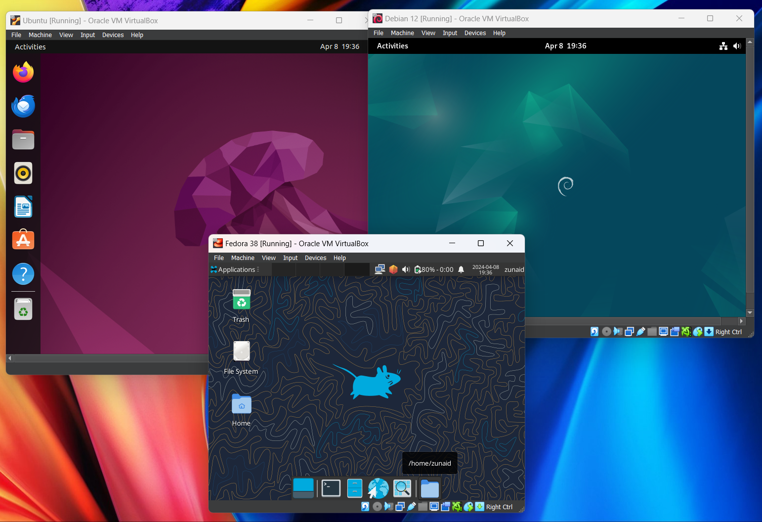 An example of Ubuntu, Debian, and Fedora Linux distributions running on the same device using VirtualBox