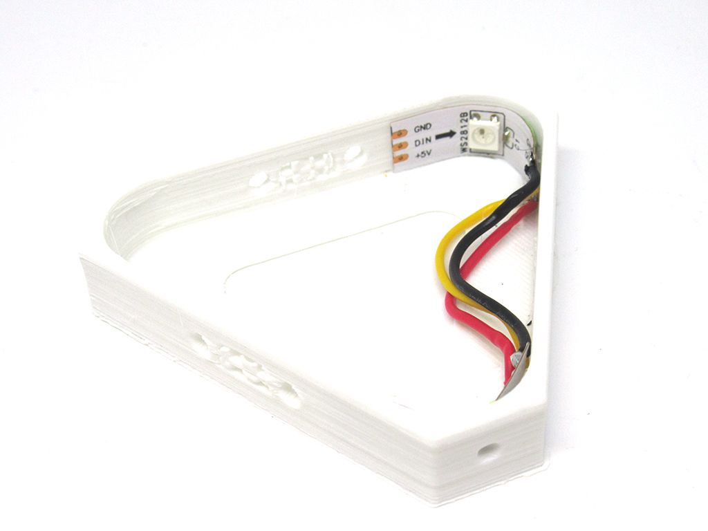 Three wires soldered to the LED strip in a mini Nanoleaf.