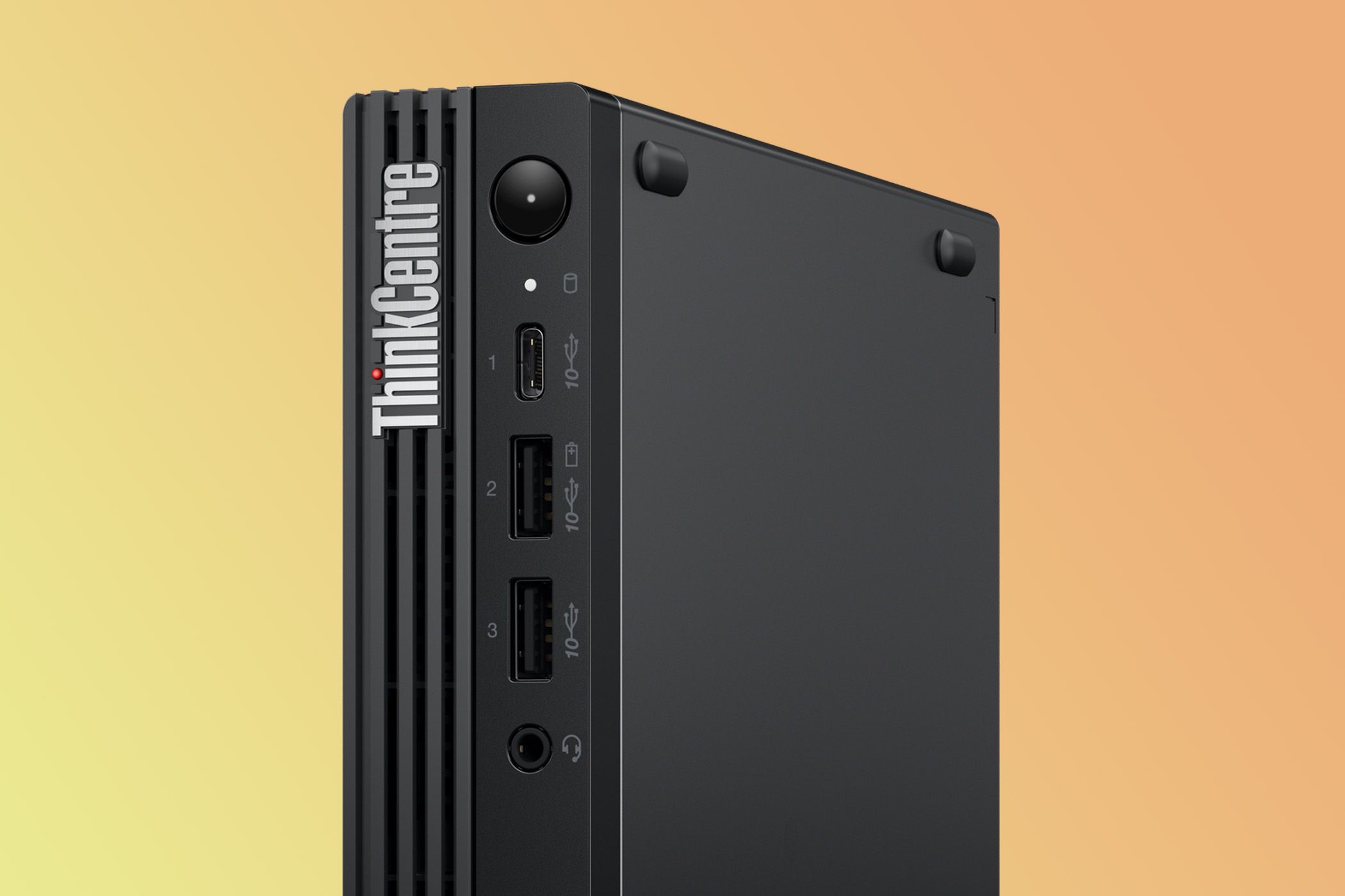 A small black tower PC with a ThinkCentre logo.