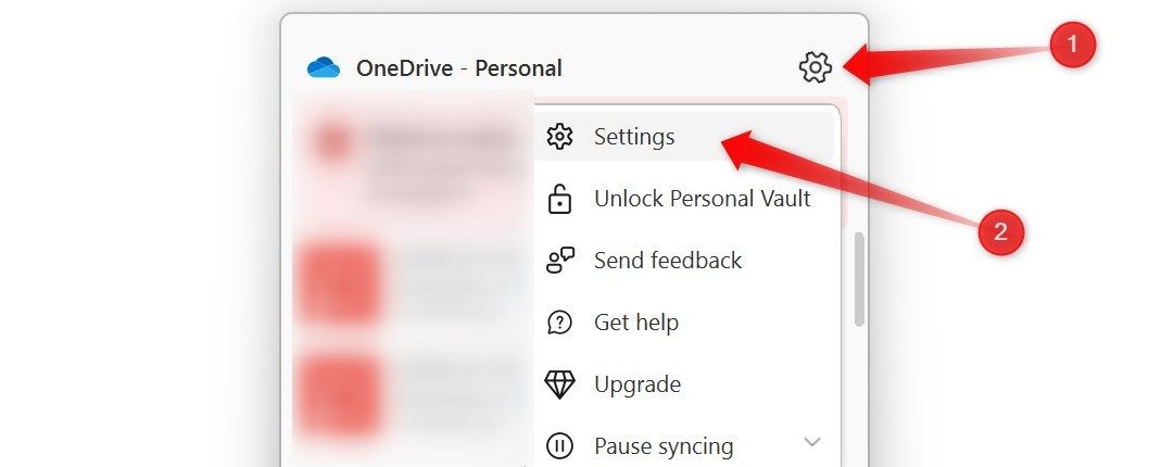 Opening OneDrive Setting from the system tray in Windows.
