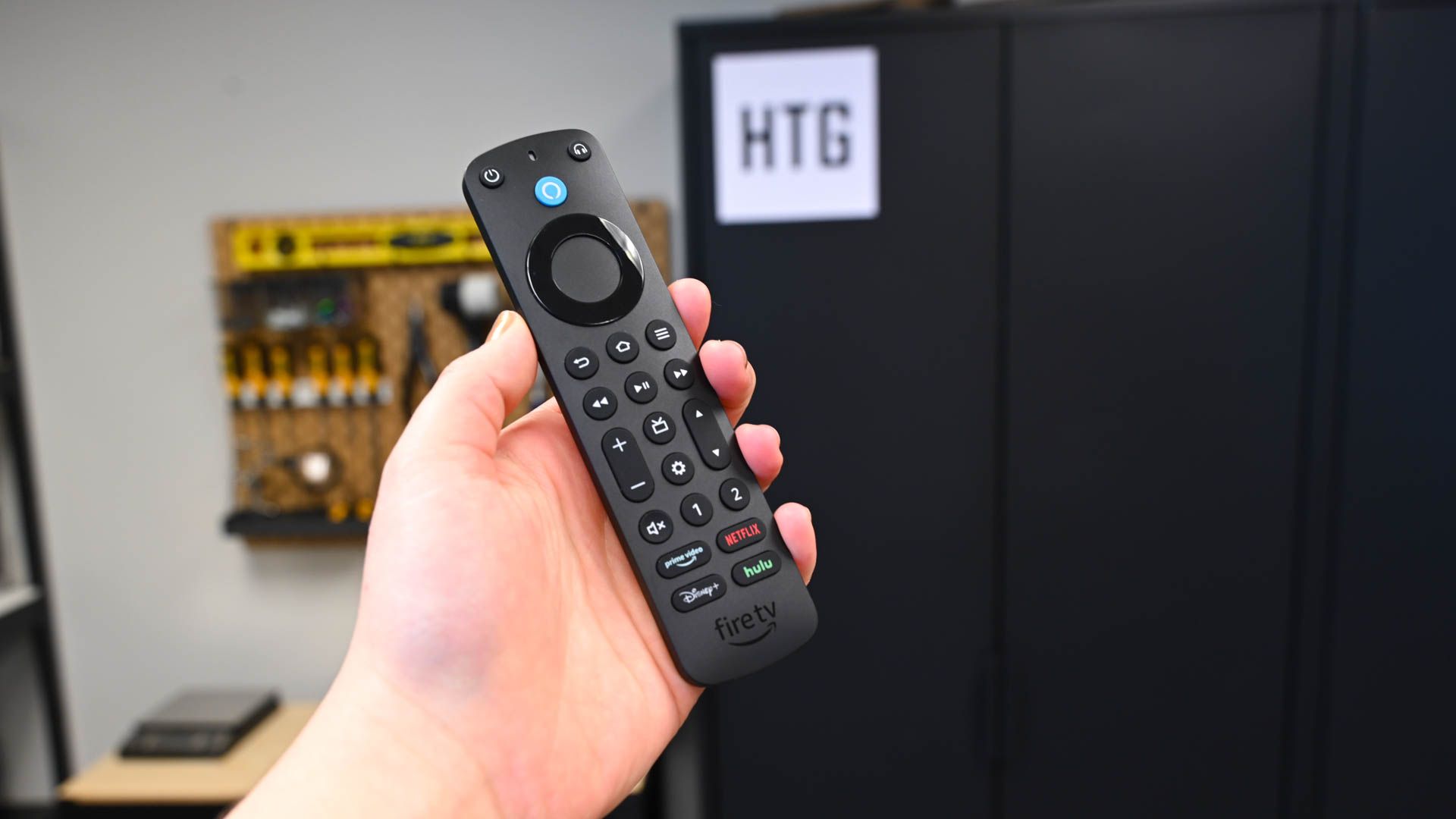 Person holding the Amazon Alexa Voice Remote Pro.