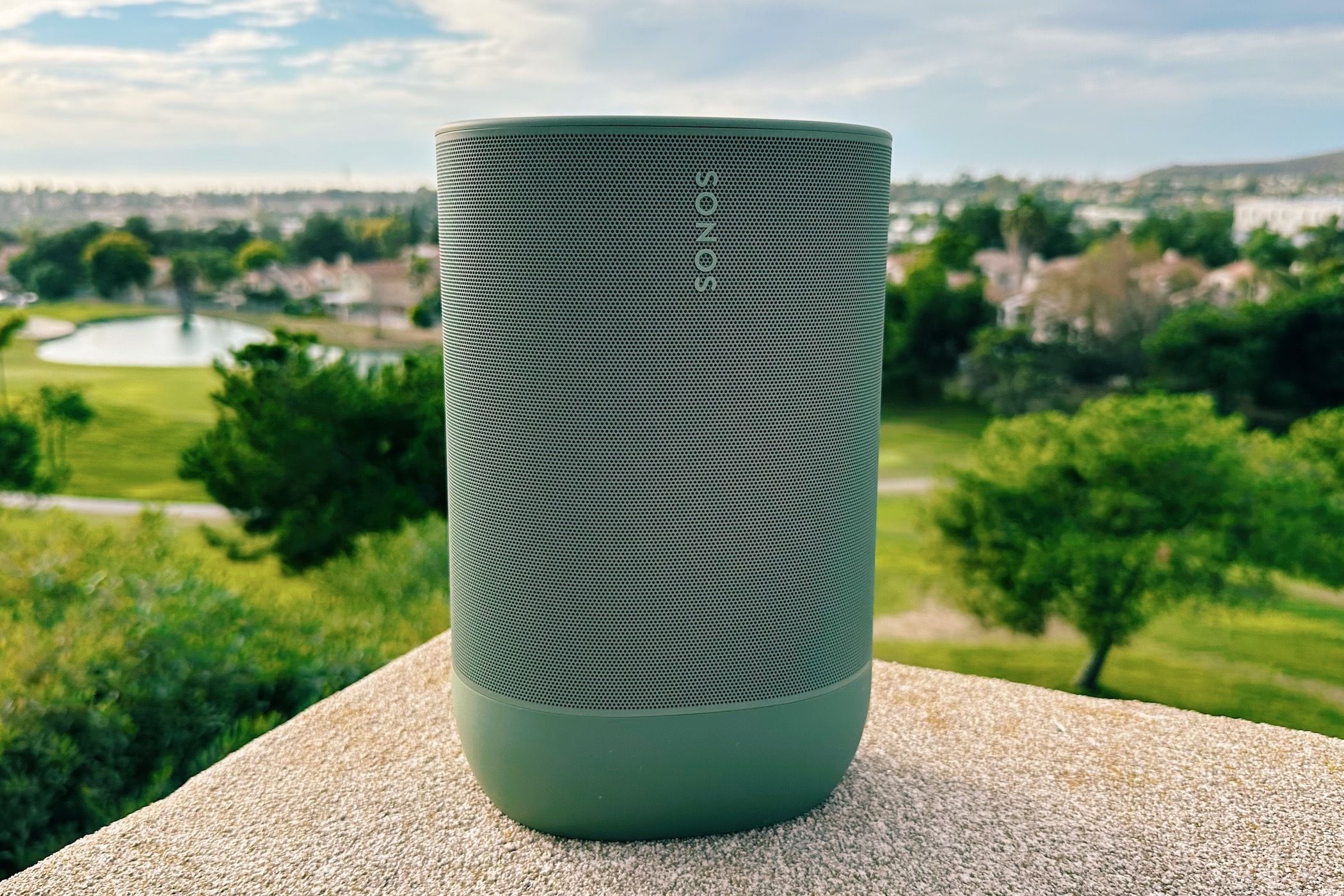 Sonos Move 2 sitting on a ledge outside