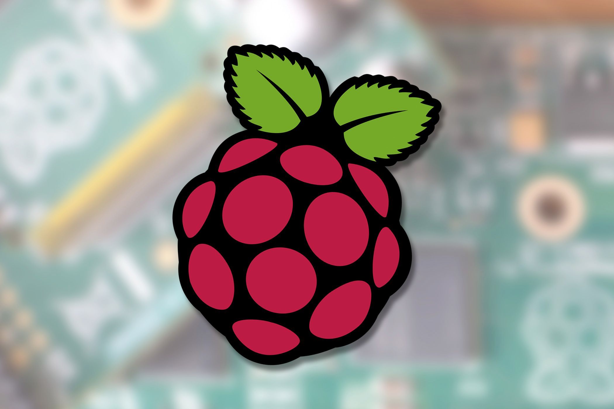 Raspberry Pi logo above a photo of Raspberry Pi boards.