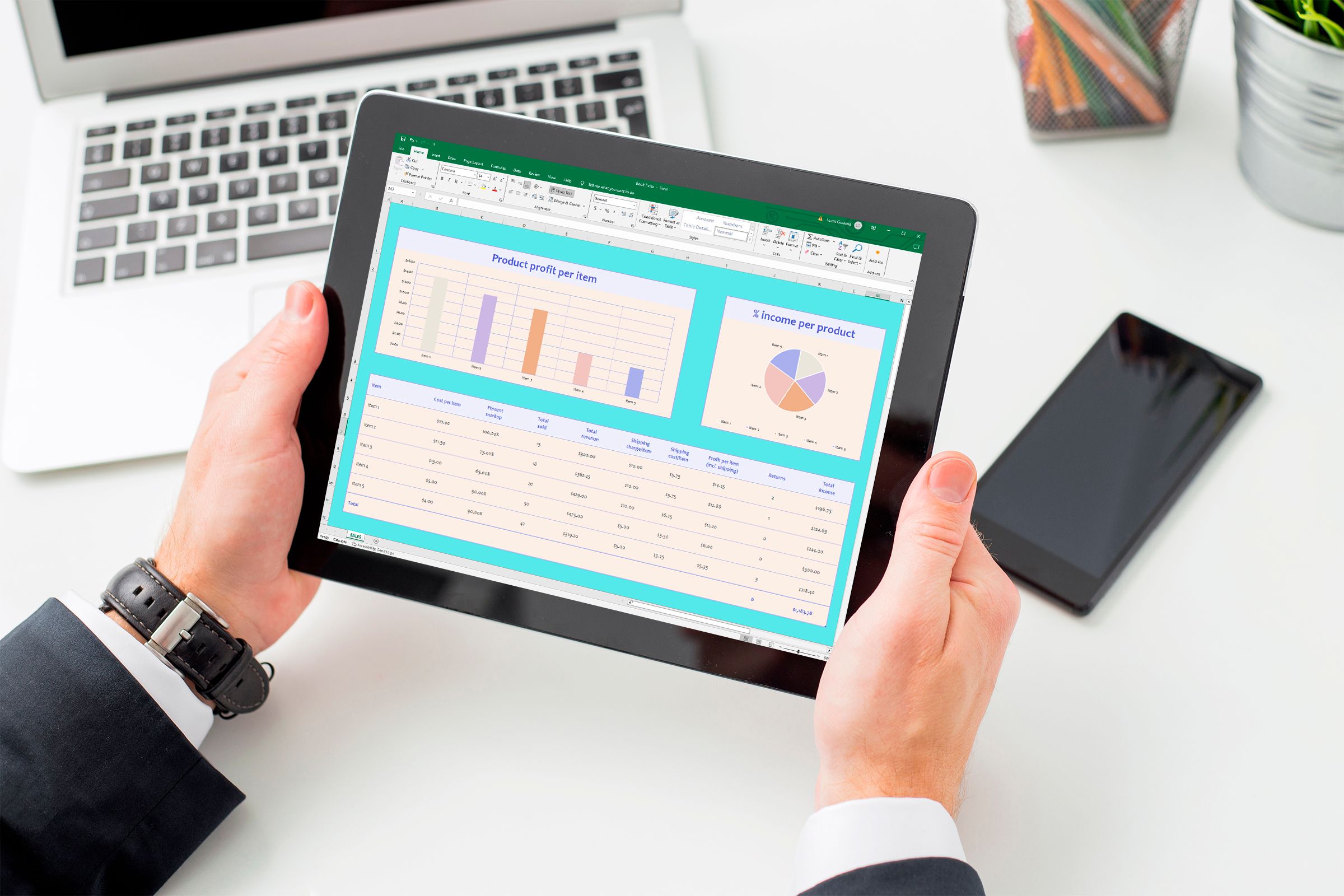 A tablet with a project management spreadsheet.