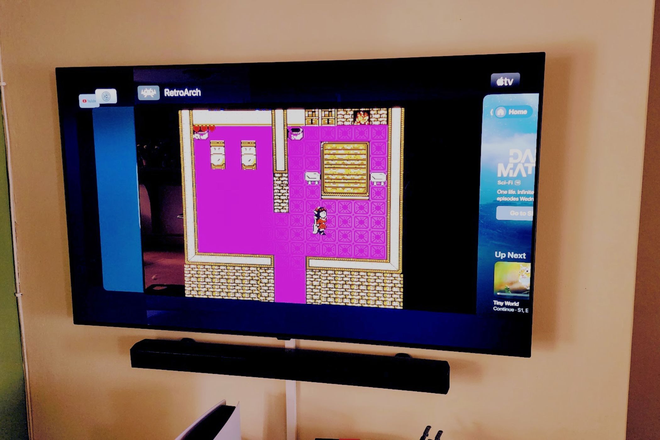 A TV showing RetroArch running an NES game on the Apple TV