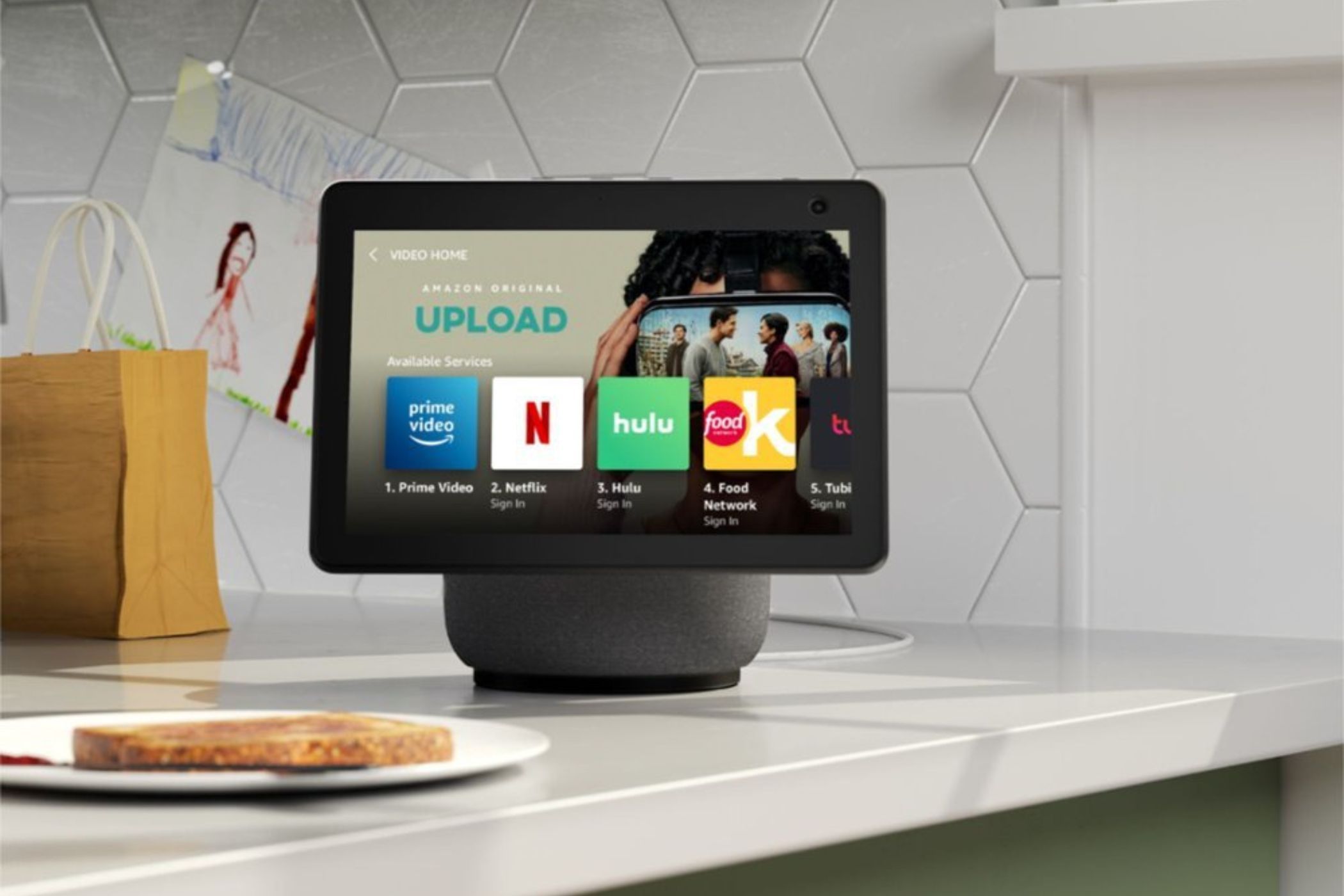 Amazon Echo Show Hub displaying Netflix, Prime Video, Hulu, and Food Network apps.