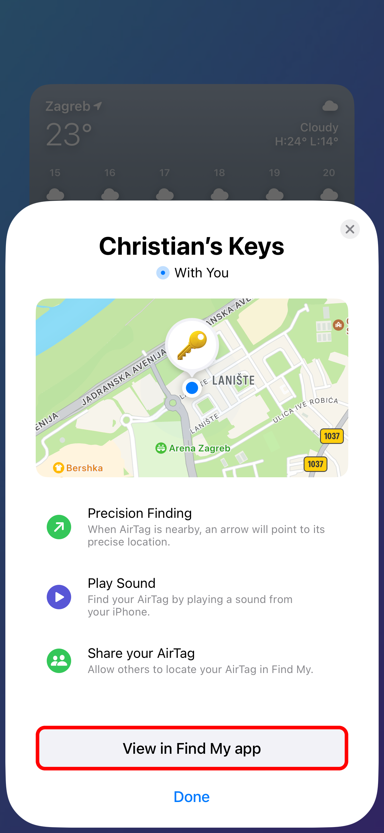 An AirTag setup card on iPhone showing the final screen when pairing a new AirTag..