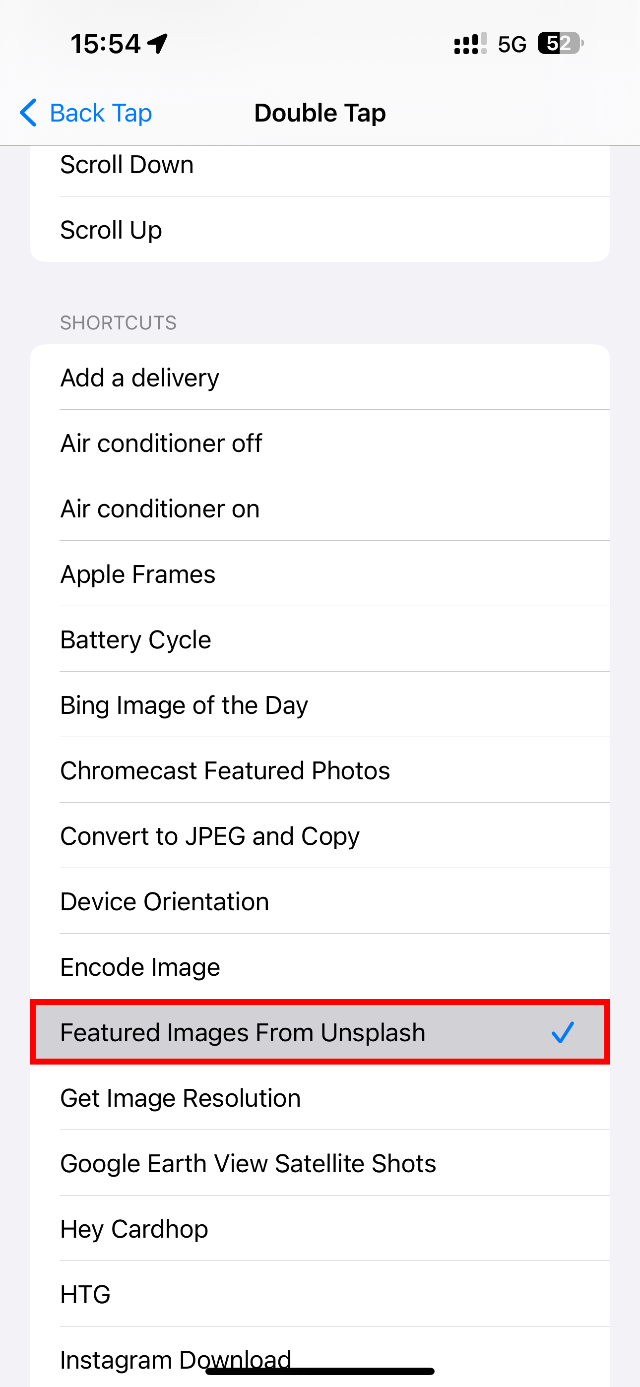 Setting the Unsplash wallpaper shortcut for the Back Tap feature in the iPhone&rsquo;s Settings app.