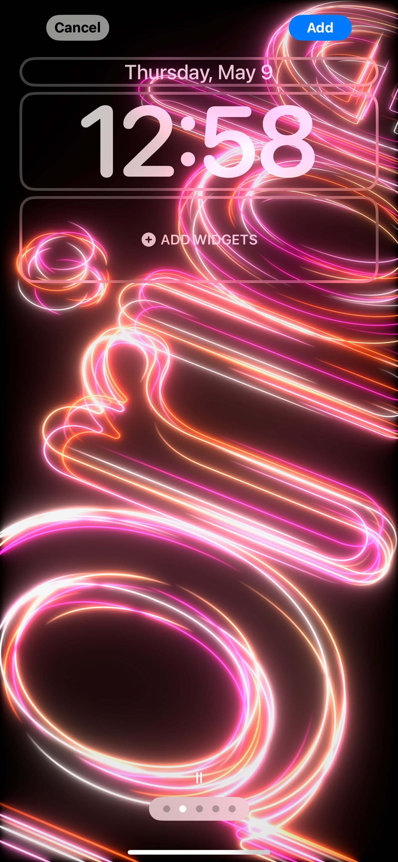 Swiping to change wallpaper color in Settings on iPhone.
