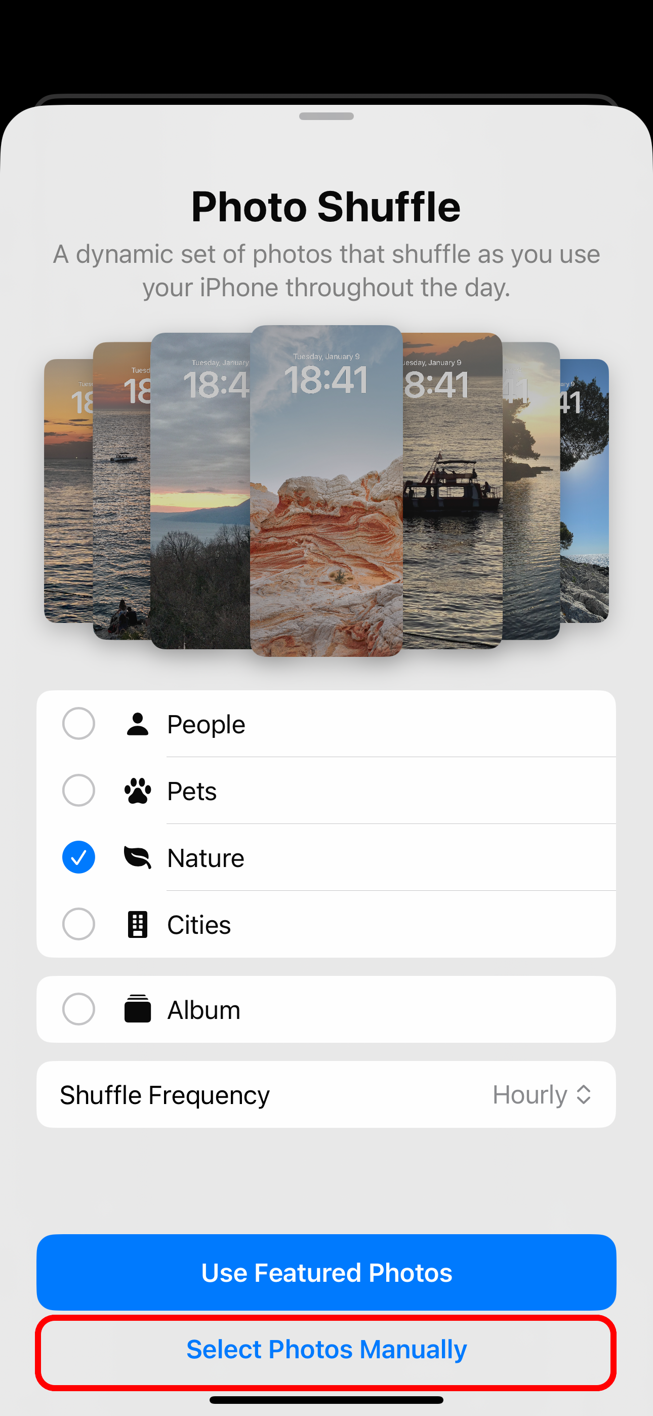 Photo Shuffle wallpaper screen on iPhone with the option to select photos manually highlighted.
