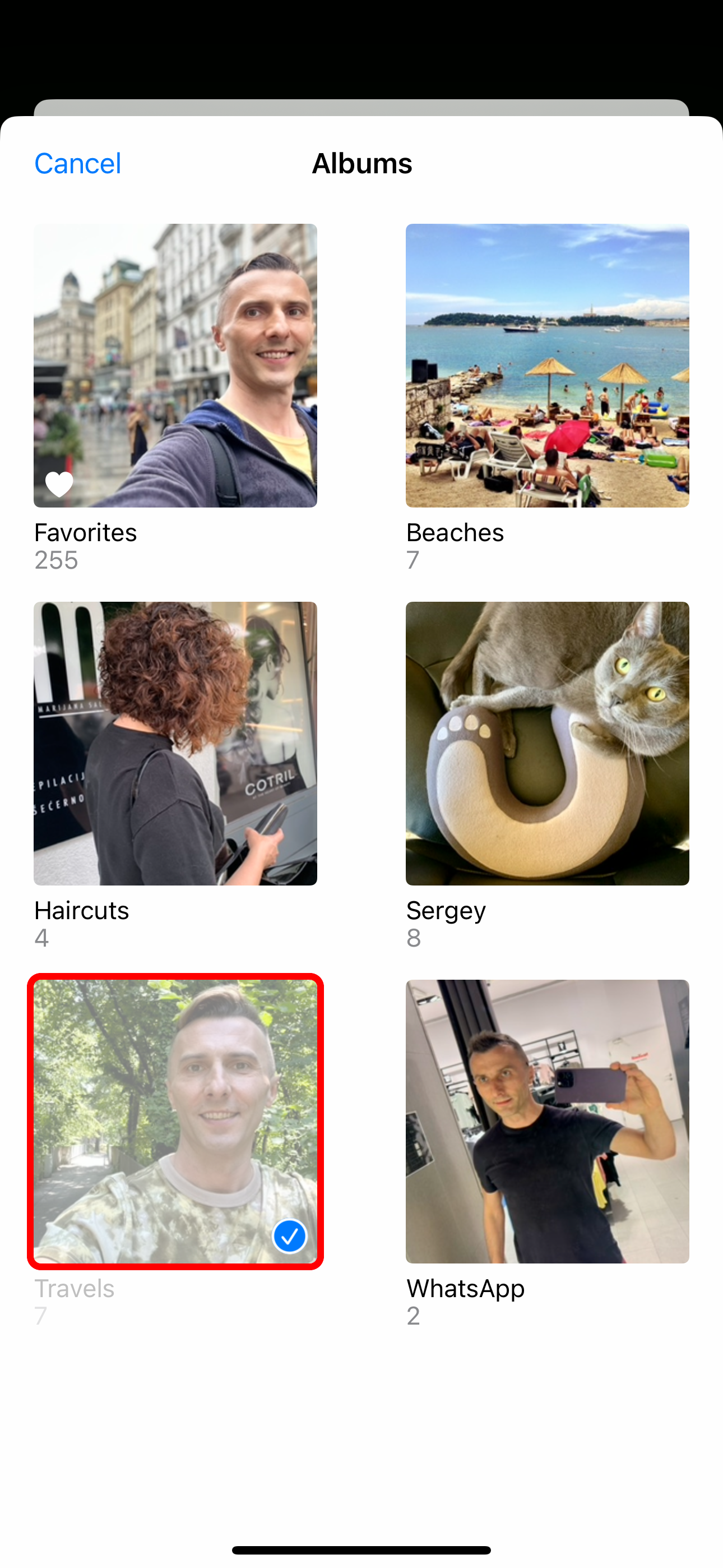 Browsing albums for a photo shuffle wallpaper on iPhone.