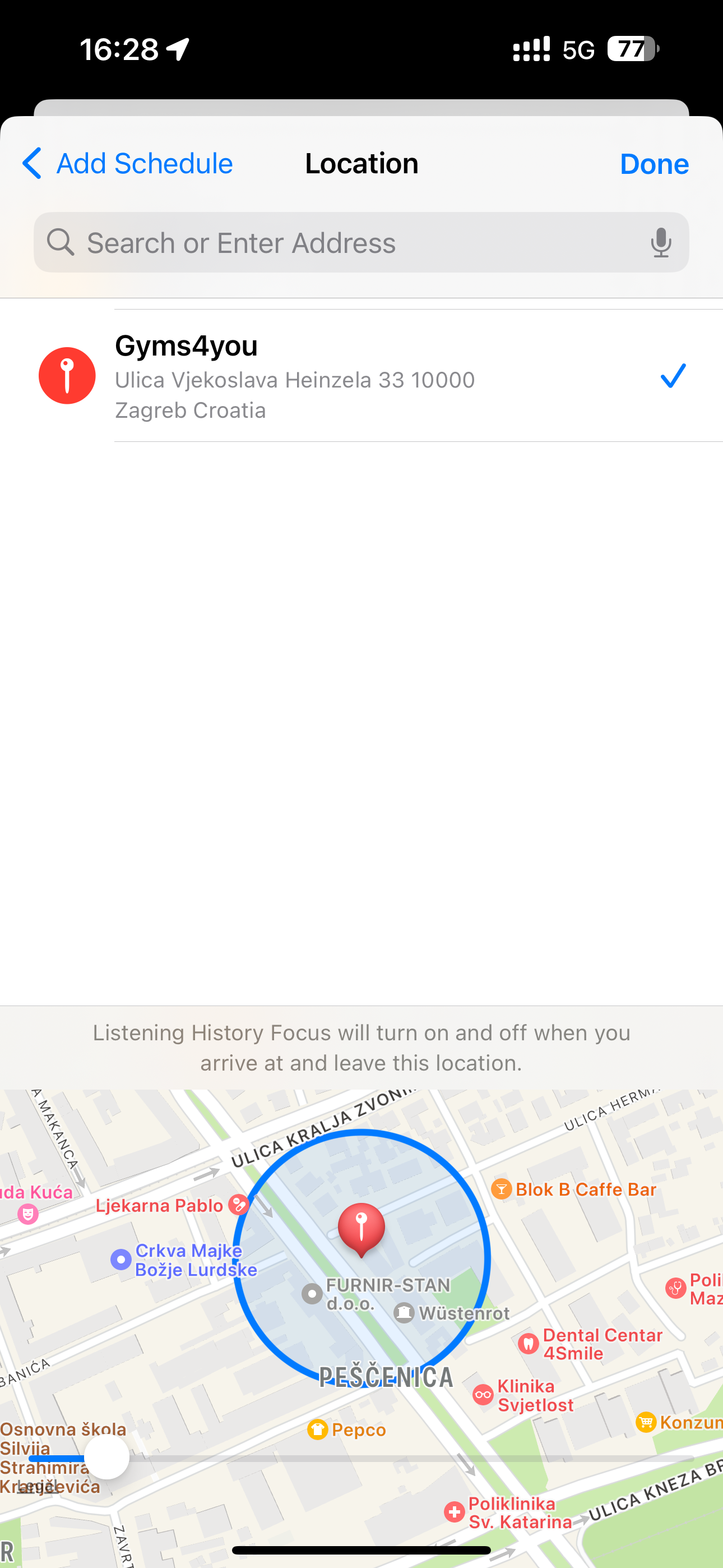 iPhone&rsquo;s Settings app showcasing creating a location schedule for the Listening History Focus mode.