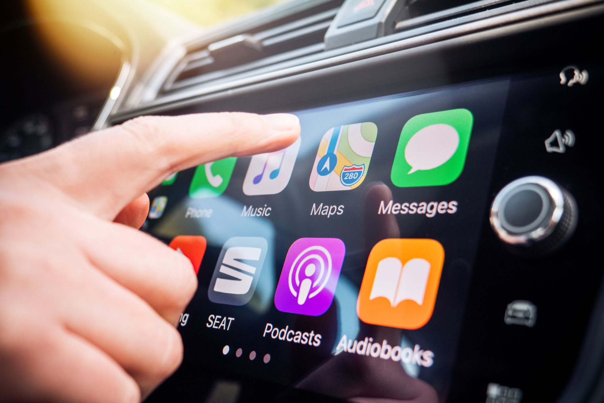 Using Apple CarPlay with a car's entertainment unit.