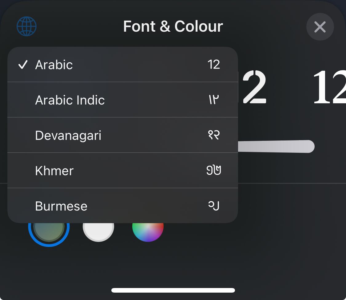 Selecting different numeral styles for the clock on an iPhone Lock Screen.