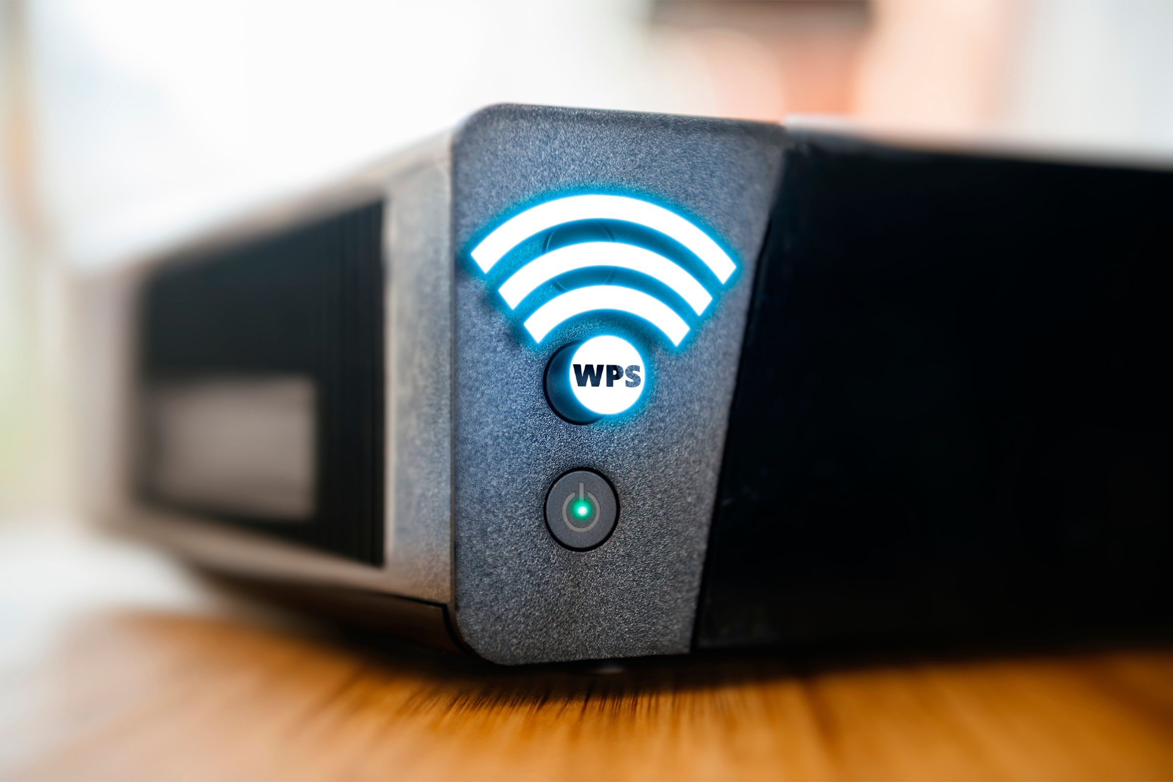 Device with the highlighted WPS button along with the Wi-Fi icon.