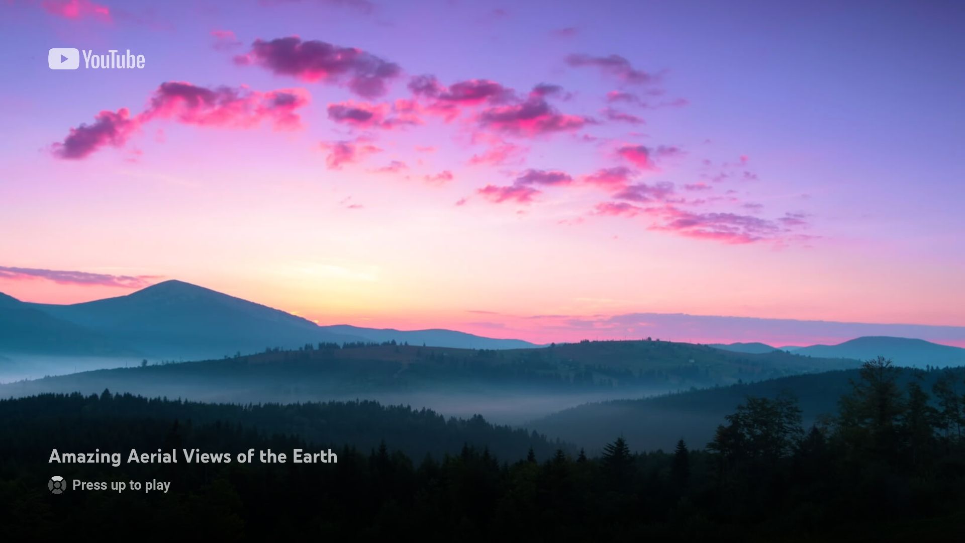 YouTube&rsquo;s screensaver on Apple TV showing aerial views of Earth.