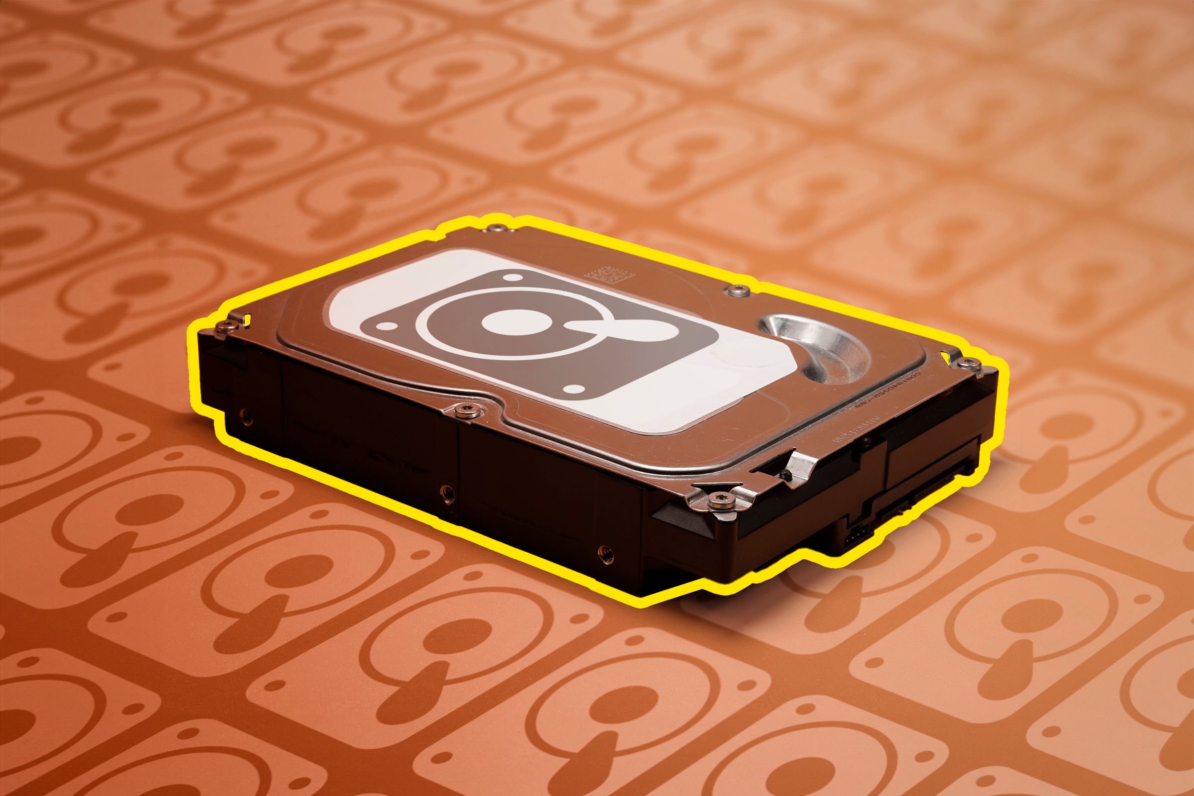 HDD on an orange background with multiple HDD icons.