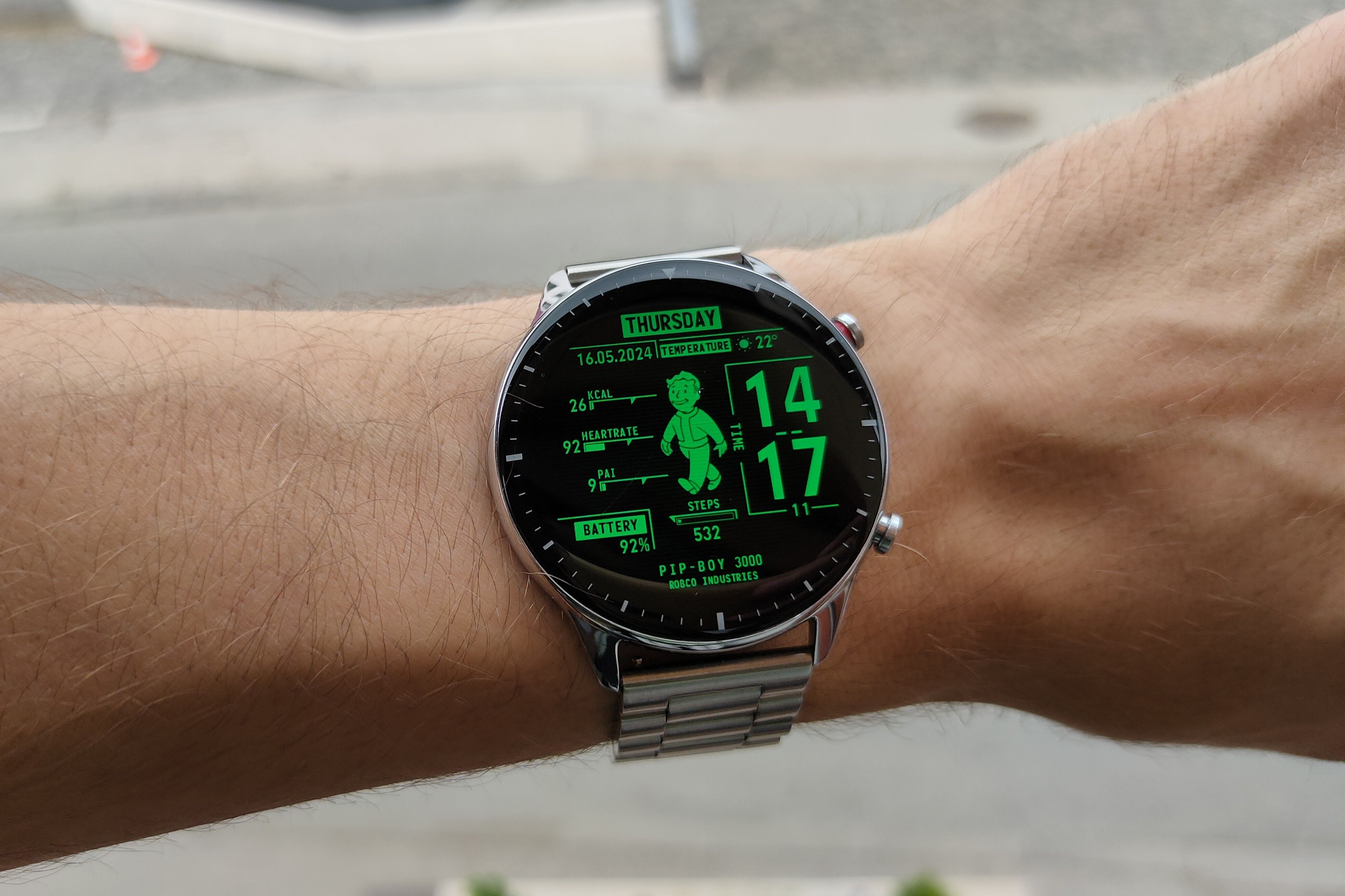 The Amazfit GTR 2 smartwatch with a stainless steel band and a Fallout Pip Boy watchface.