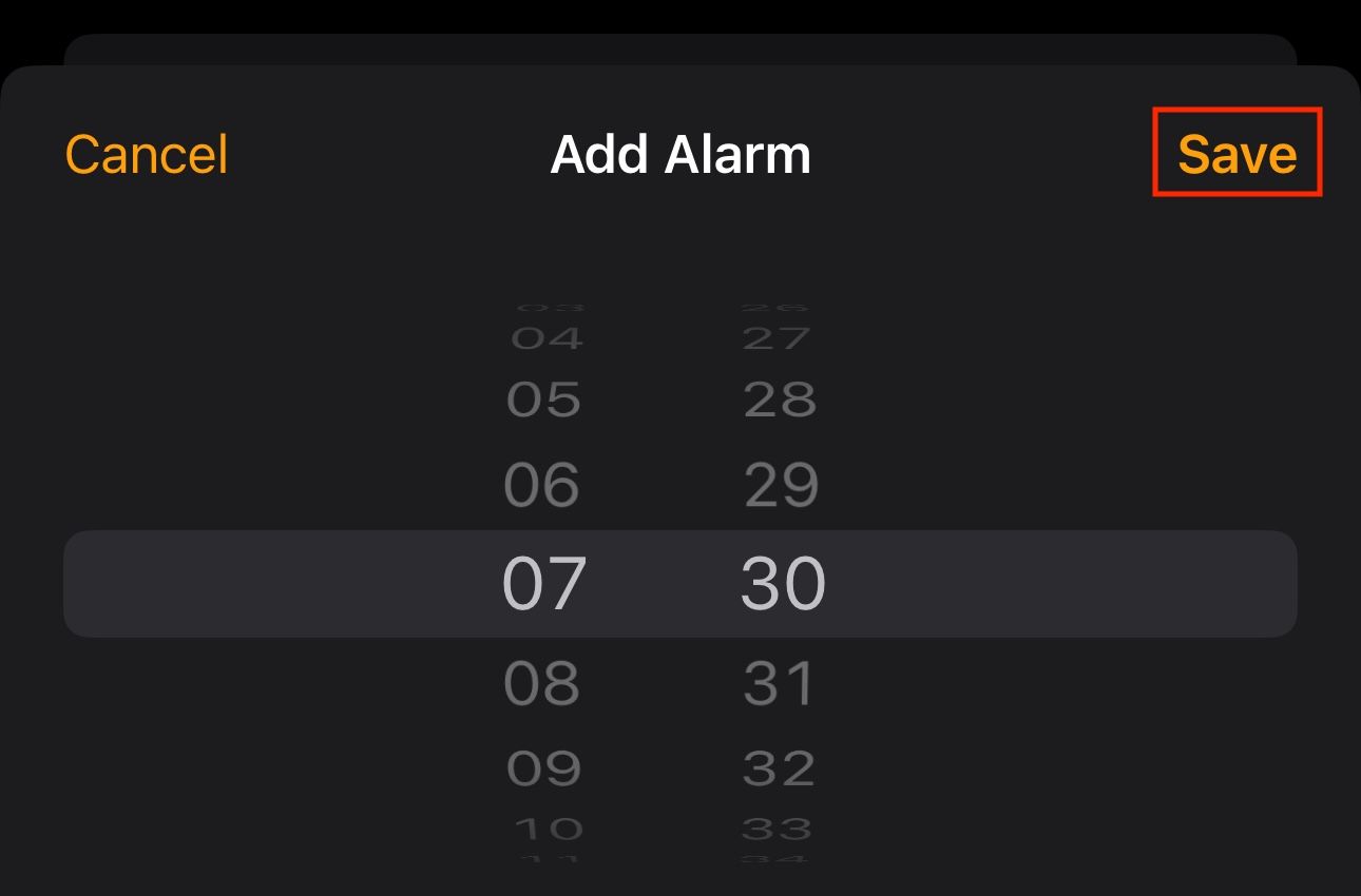 Saving a silent alarm in the Watch app on an iPhone.