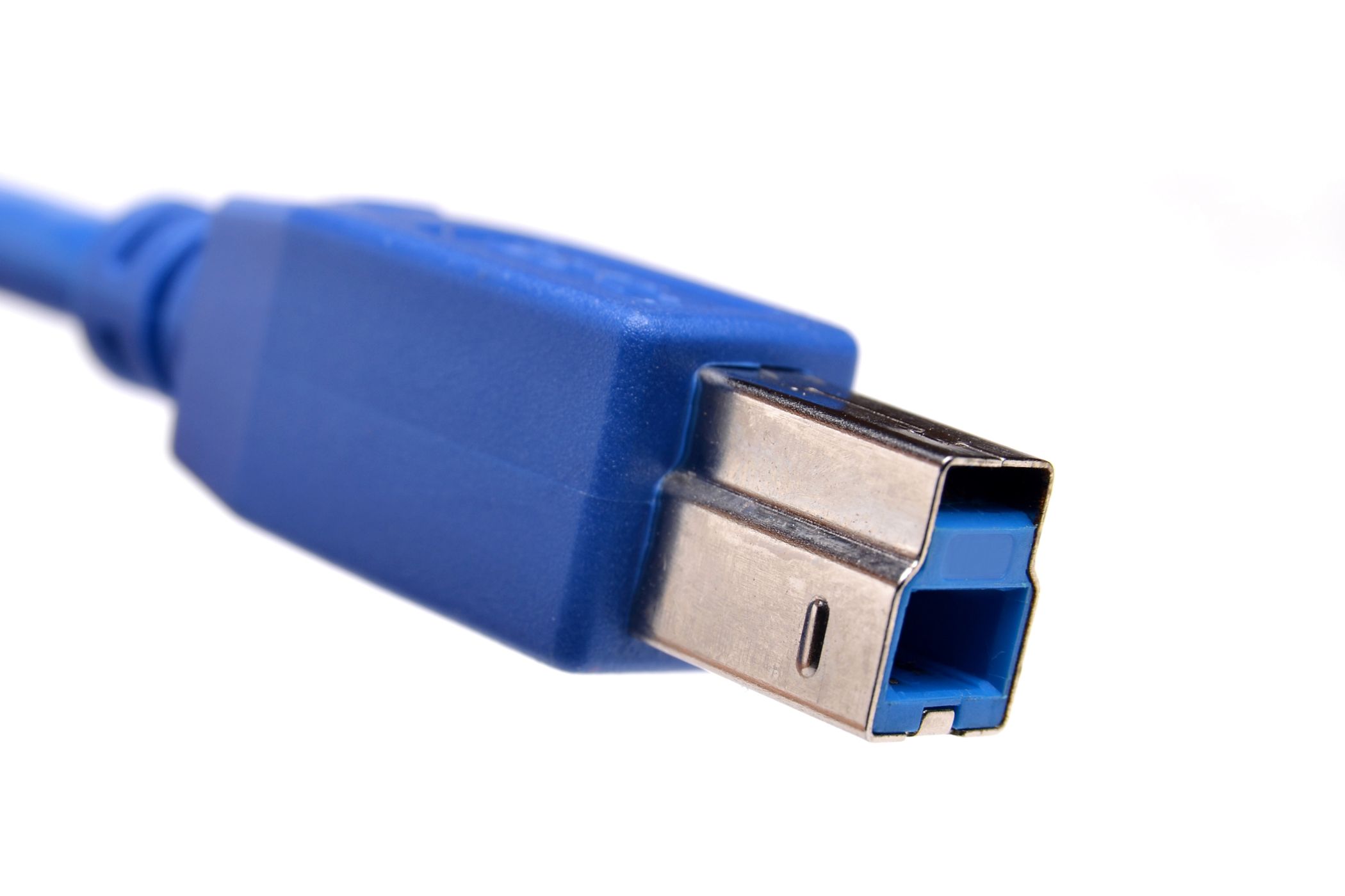 Universal Serial Bus (USB) 3.0 type B connector isolated on white.