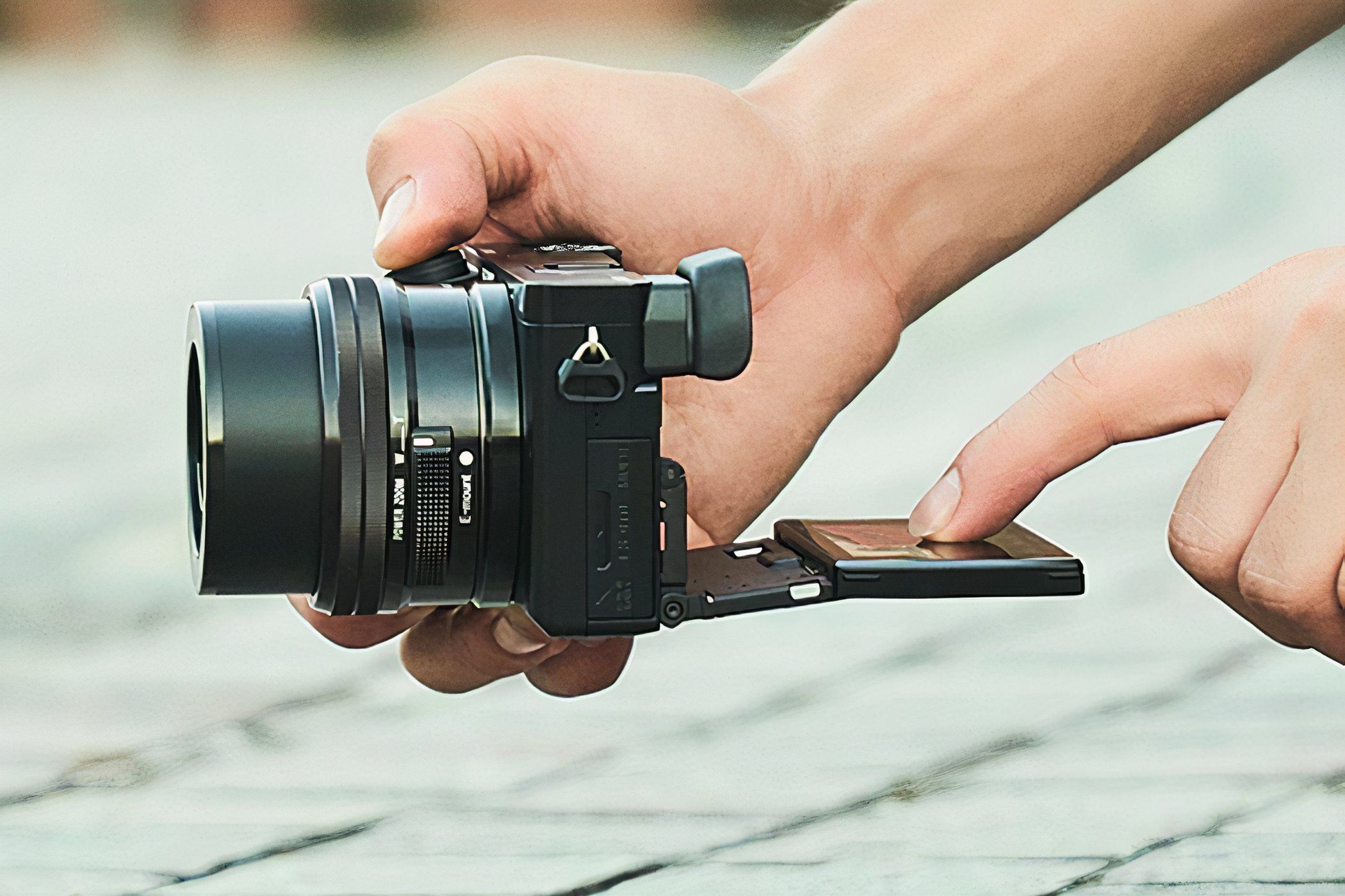 Someone shooting with the Sony a6100 at ground level.