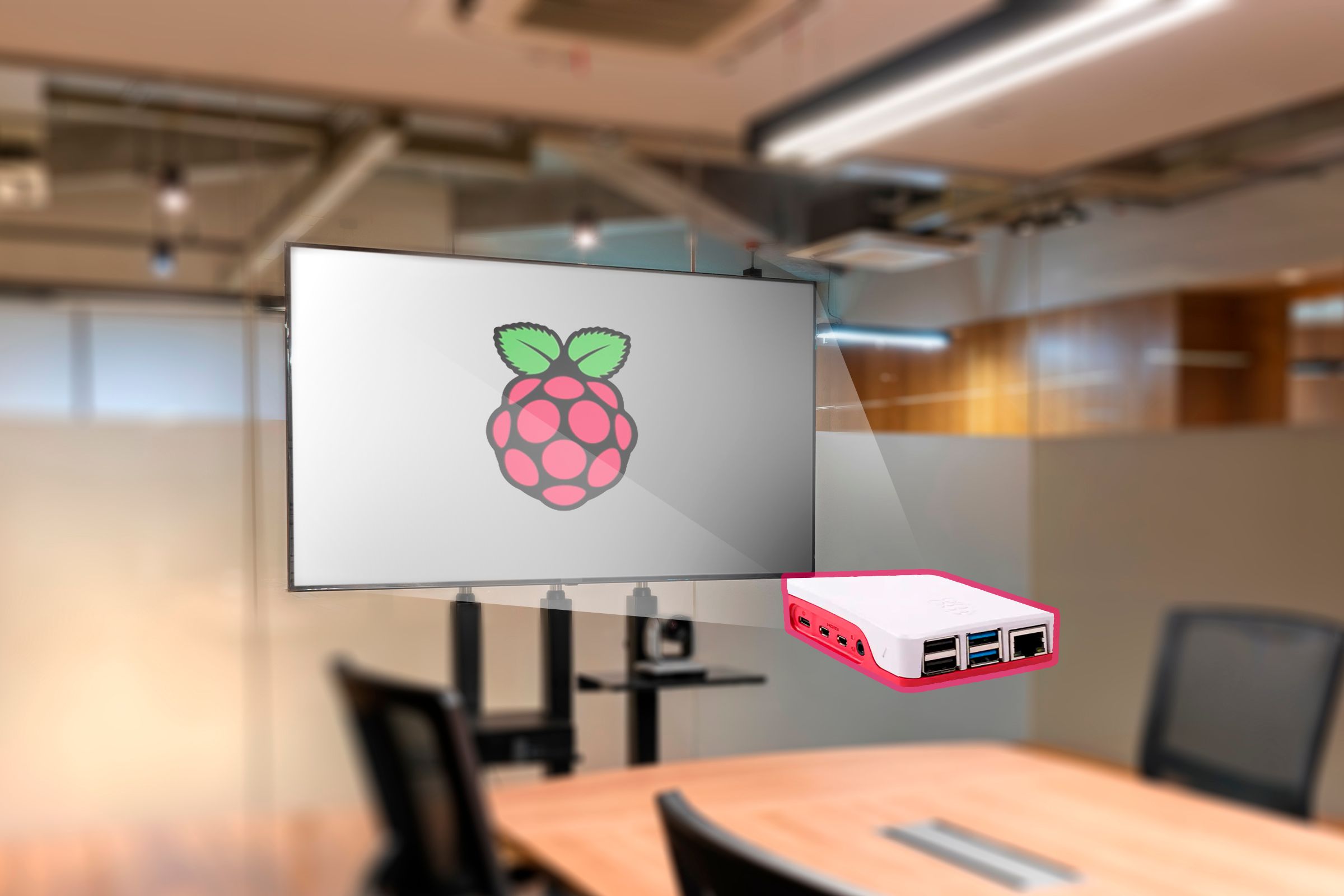 Television with a slideshow with Raspberry Pi logo on the screen.