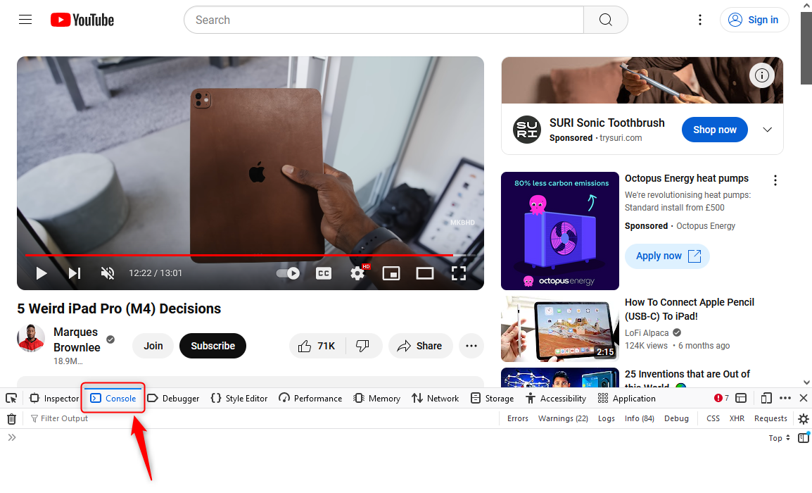 YouTube with the browser's developer tools open and an arrow showing the Console tab.