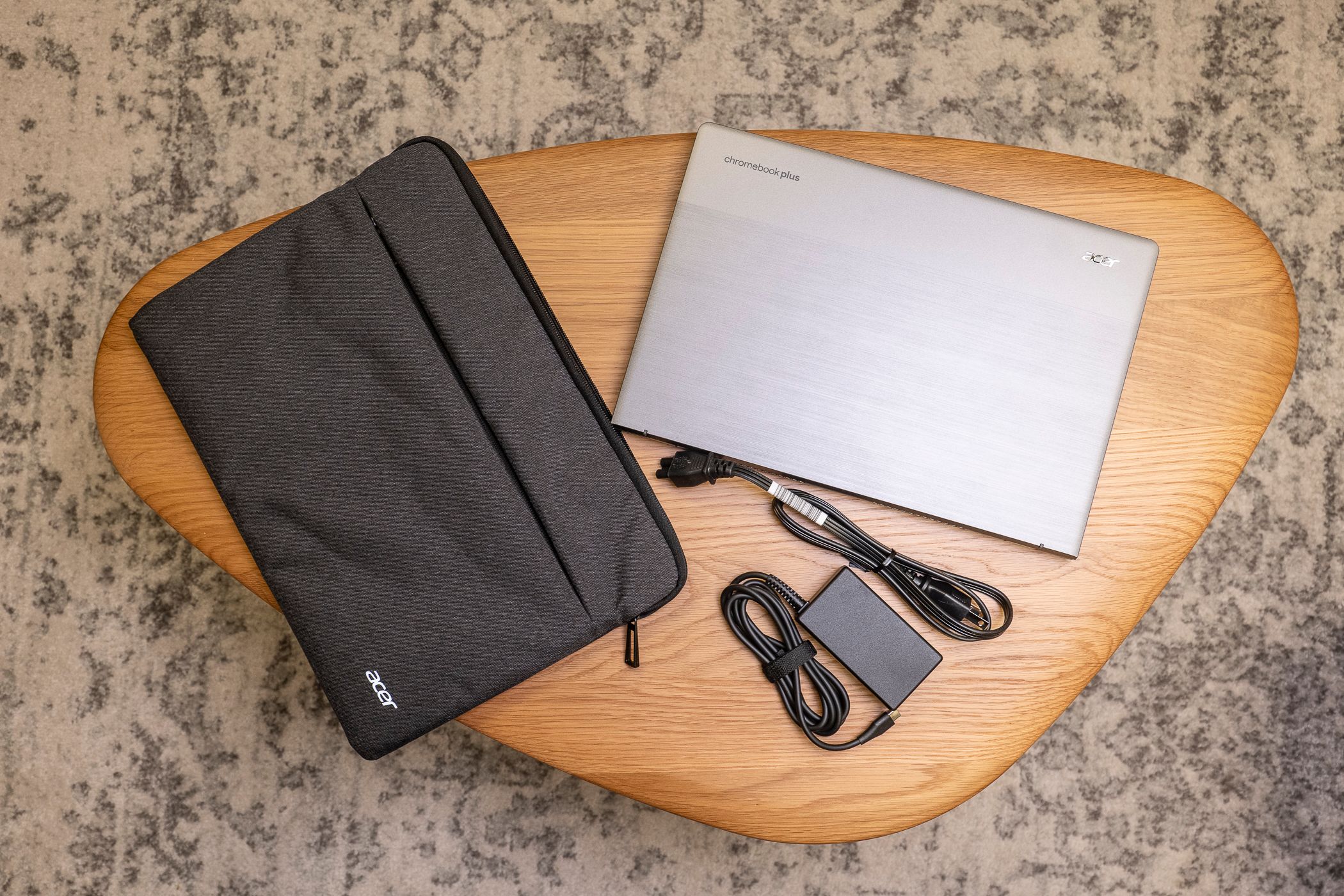 The Acer Chromebook Plus 514 with case and power cable.