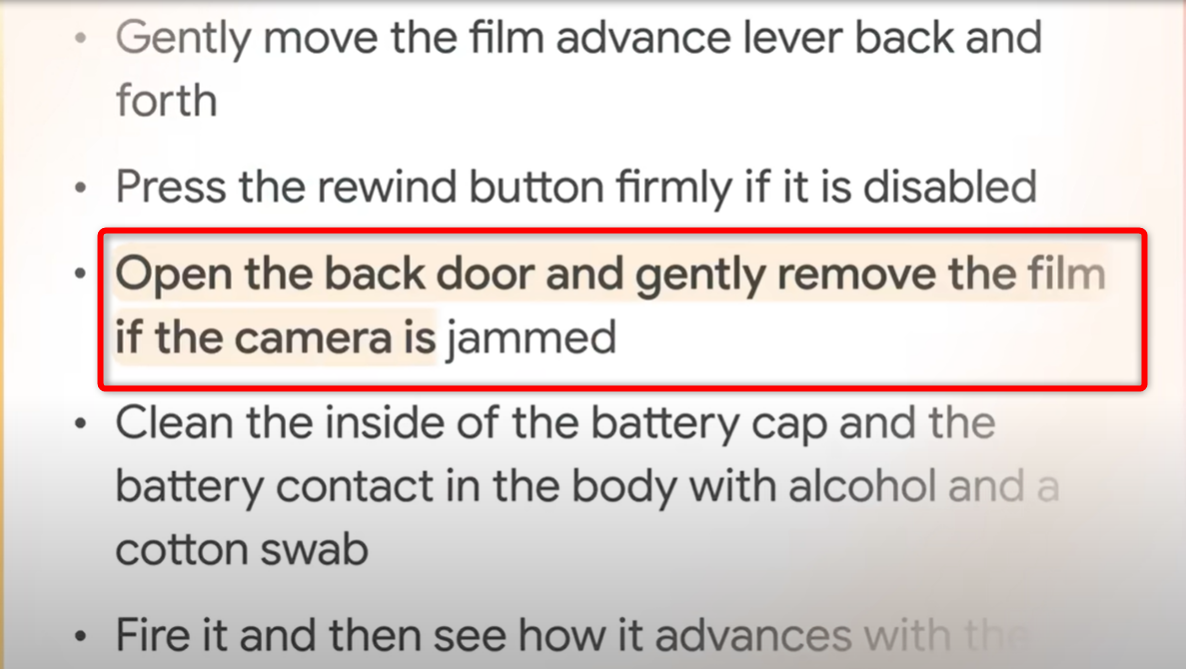 A Google overviews response to a query about how to fix a jammed film camera-1