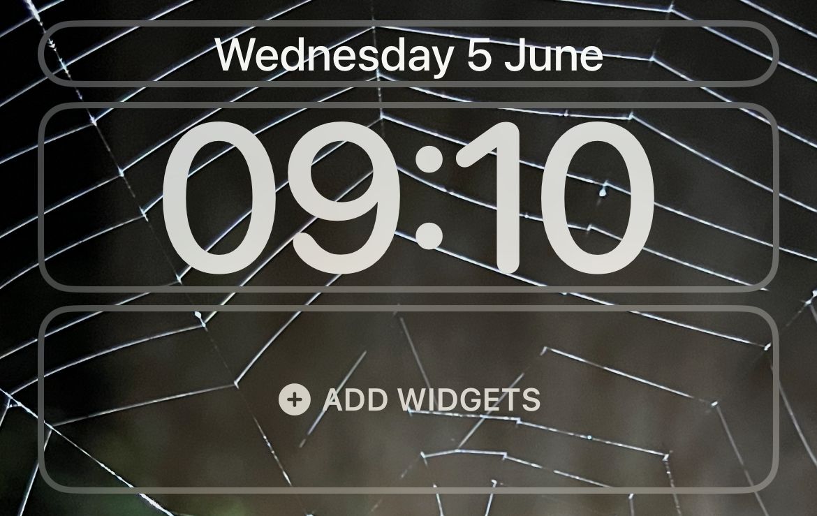 Add widgets to your Lock Screen using the "Add Widgets" zone.
