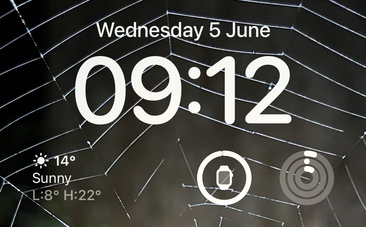 Weather, battery, and fitness widgets on an iPhone Lock Screen