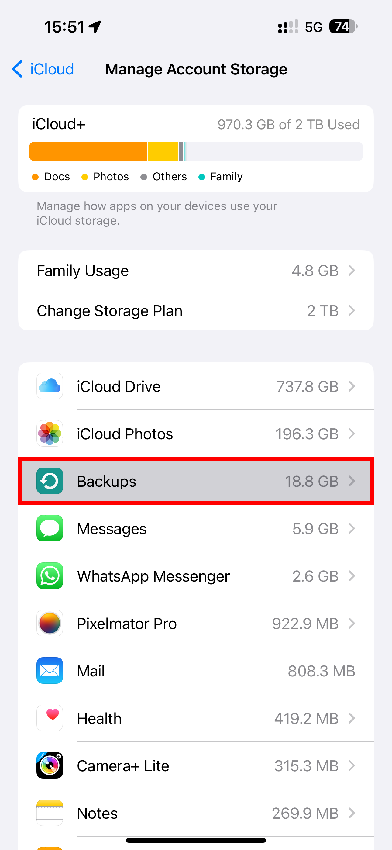 The iPhone's Settings app showing the iCloud settings with the Backups option selected on the Manage Account Storage screen