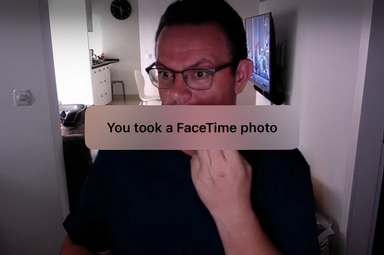 FaceTime video call on iPhone displaying a notification that a Live Photo has been taken.