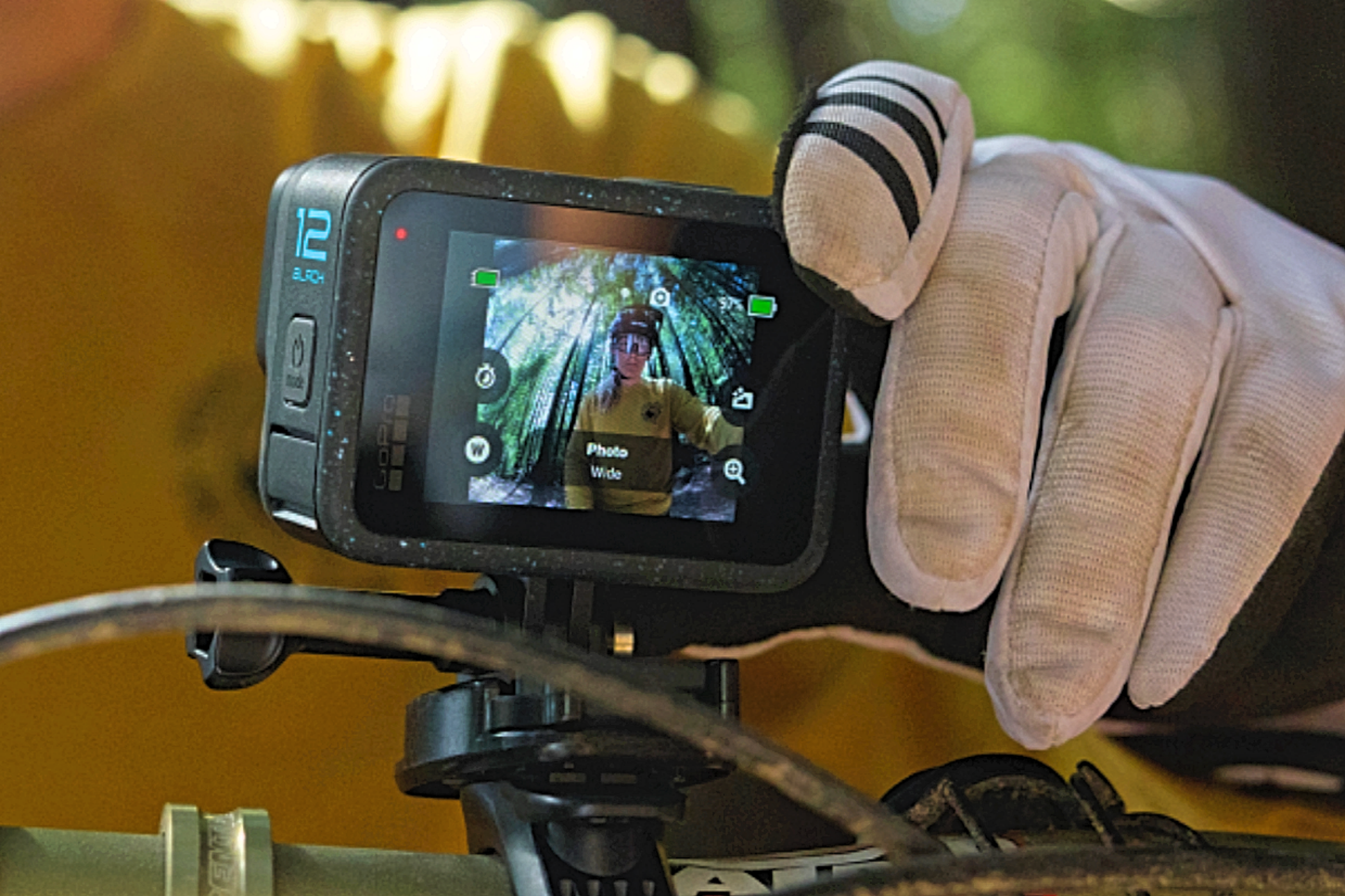 A GoPro HERO12 Black mounted on the front of a bicycle.