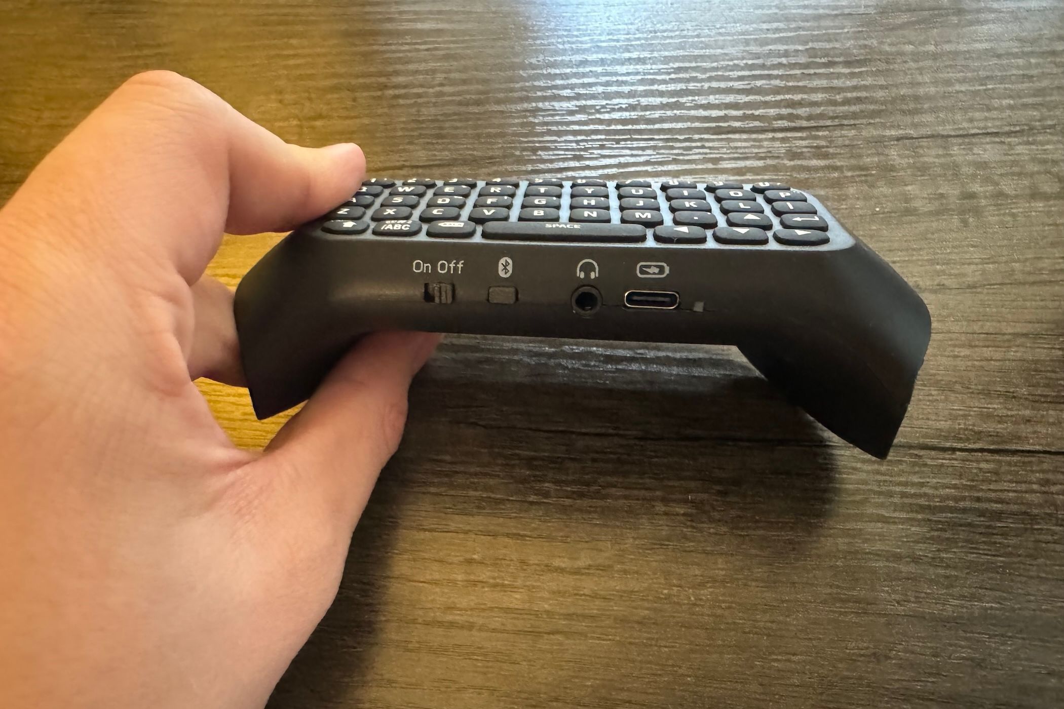 Bottom of a clip-on controller keypad.