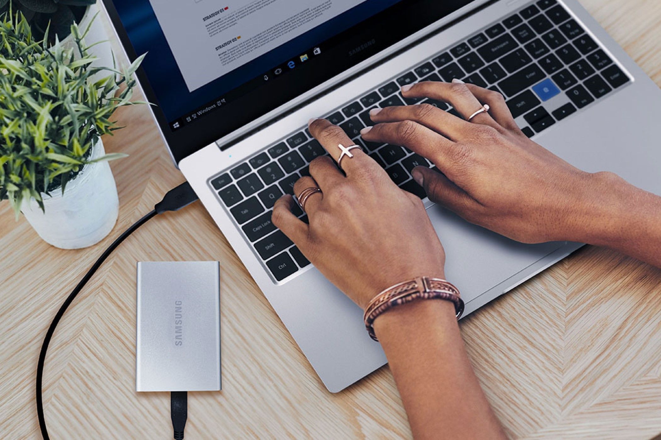 Samsung T7 connected to a laptop.