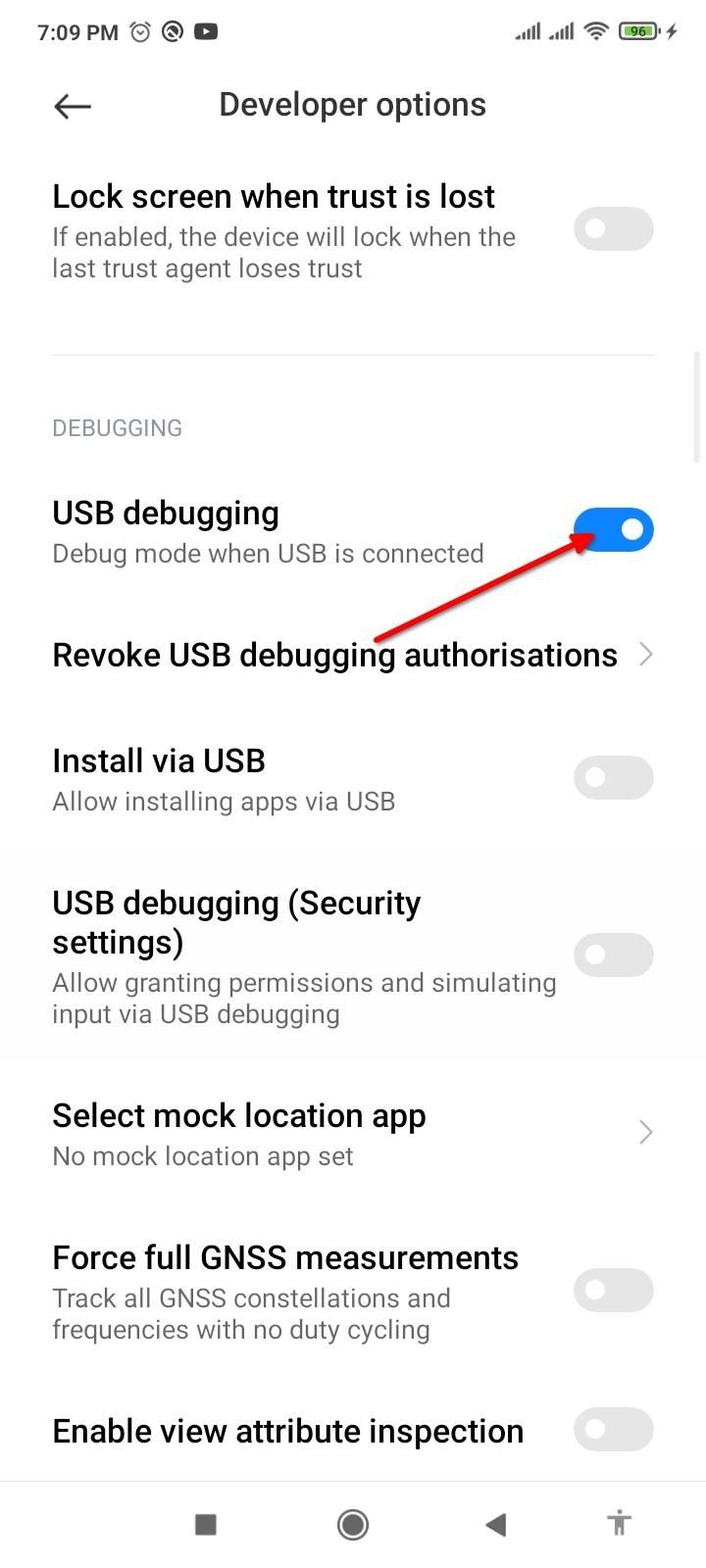 Enabling USB debugging in developer options.