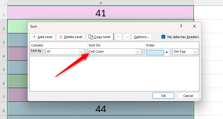 Excel's Sort dialog box, with Sort On changed to Cell Color.