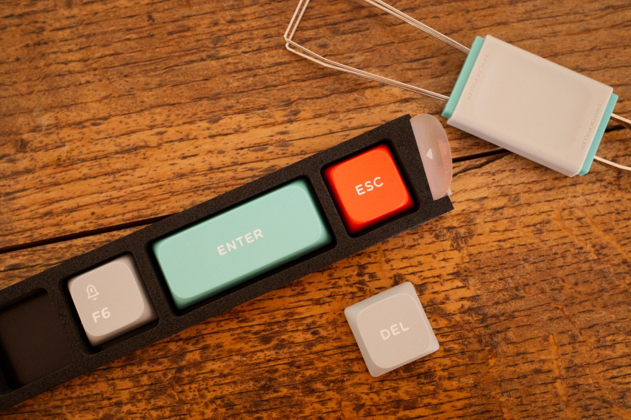 A set of spare keys received with the NuPhy Air75 V2 mechanical keyboard.